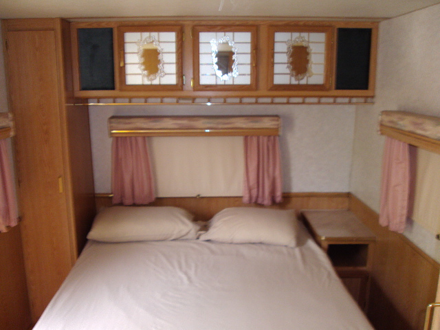 Private bedroom with double bed in PU 12 Trailer (Sheets and Pillows provided but no blanket or comforter)